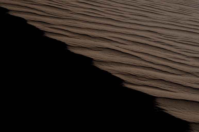 Sand dune in the high desert just north of the Little Colorado River on the Navajo Reservation, Arizona