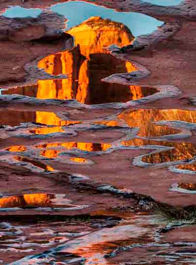 Cathedral Rock reflecting in puddles along Oak Creek, Arizona