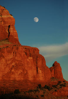 Moon rising over Courthouse Butte in the red rock country near Sedona, Arizona